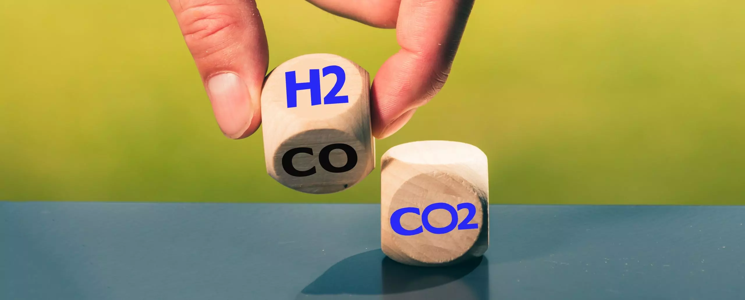 Change to fuel cell vehicles. Hand flips a dice and changes the expression CO2 to H2.